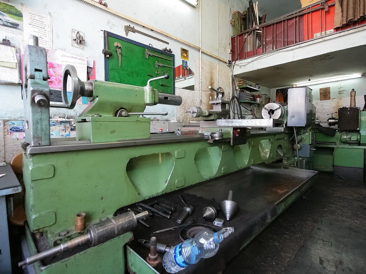 Lathe and tooling in a single-unit machine shop
